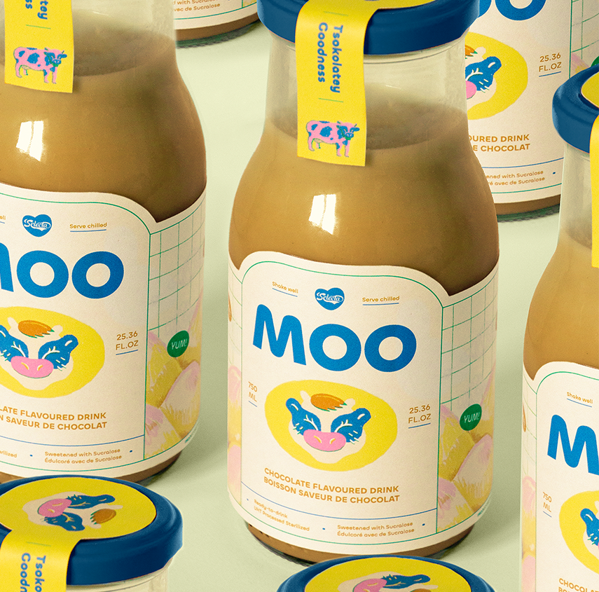 angled shot of seven moo chocolate bottles